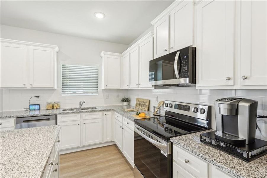 Furnished interior view inside a new home in Fairview Lake, Conyers (Image 14).