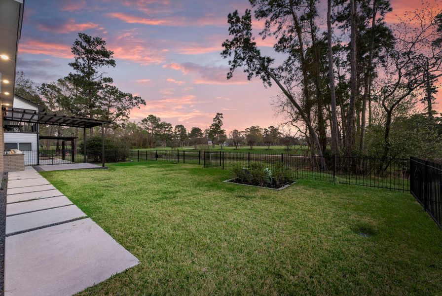 Exterior details and patio area of a home in , The Woodlands (Image 33).