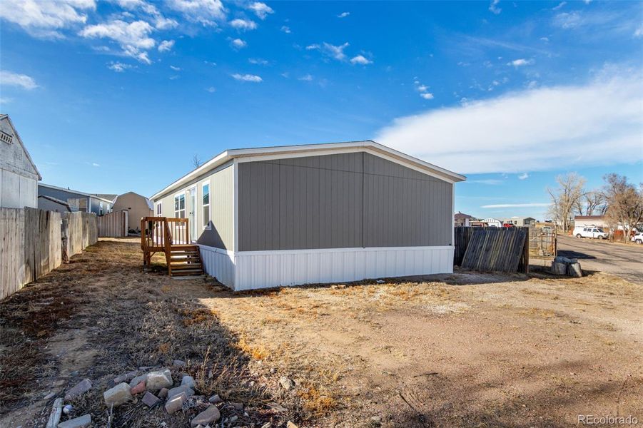 Exterior details and patio area of a home in , Colorado Springs (Image 22).