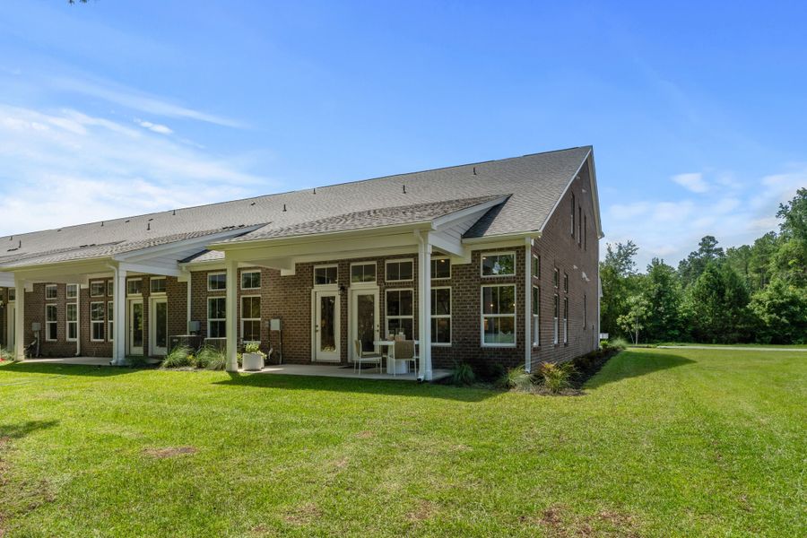Exterior details and patio area of a home in Long Bay Golf Club, Longs (Image 20).