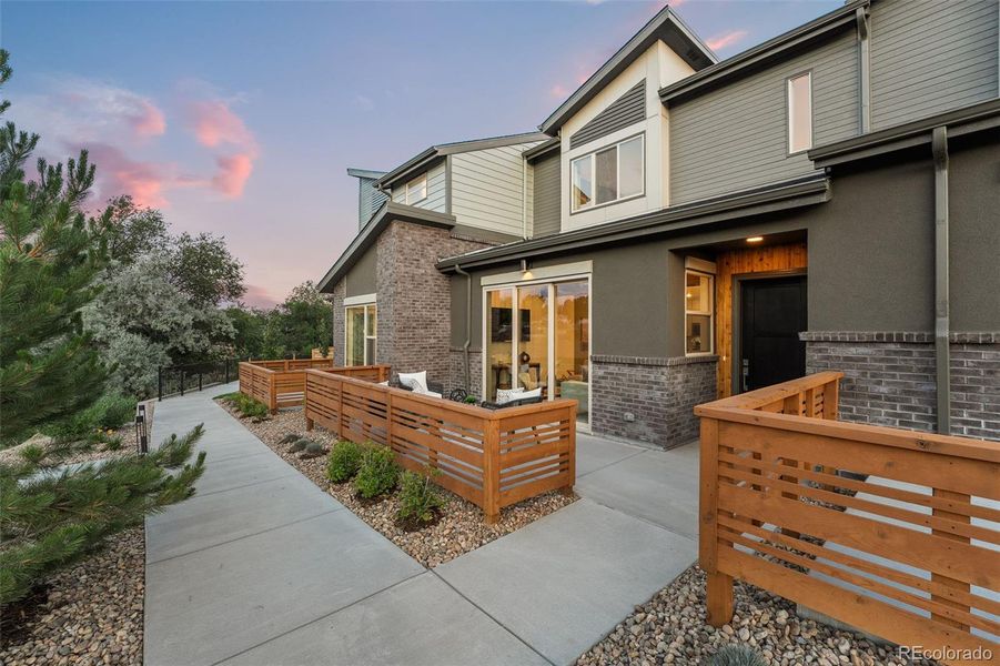 Front exterior of a new home in , Arvada, CO, highlighting curb appeal (Image 18).