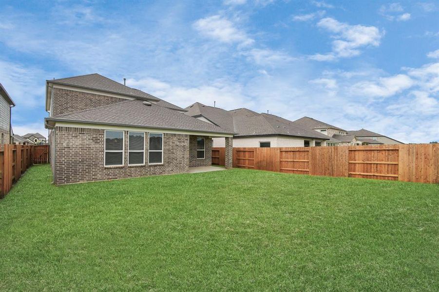 Explore the expansive backyard with its inviting covered patio—a perfect blend of space for the kids to play and adults to unwind. Ideal for creating your outdoor oasis, this backyard accommodates patio furniture, a BBQ pit, and endless possibilities for leisure and entertainment.