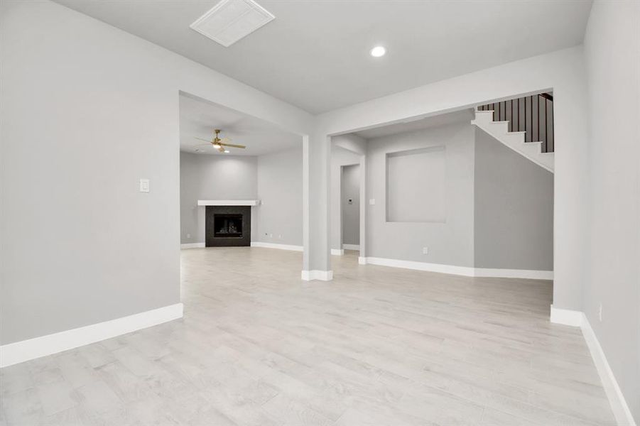 Discover another perspective of the dining area. Sample photo of completed home with similar floor plan. Actual colors and selections may vary.