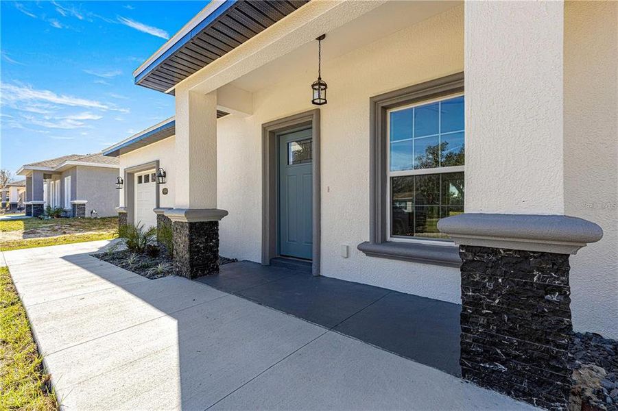 Exterior details and patio area of a home in , Summerfield (Image 3).