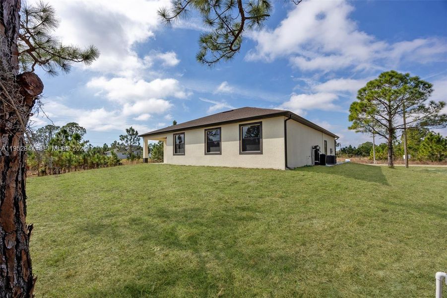 Exterior details and patio area of a home in , Lehigh Acres (Image 21).