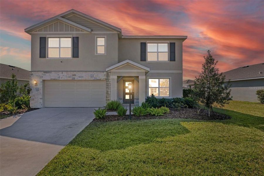 Front exterior of a new home in , Bradenton, FL, highlighting curb appeal (Image 28).