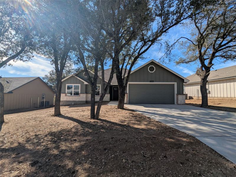 Front exterior of a new home in , Lampasas, TX, highlighting curb appeal (Image 1). Front exterior of a new home in , Lampasas, TX, highlighting curb appeal (Image 1).