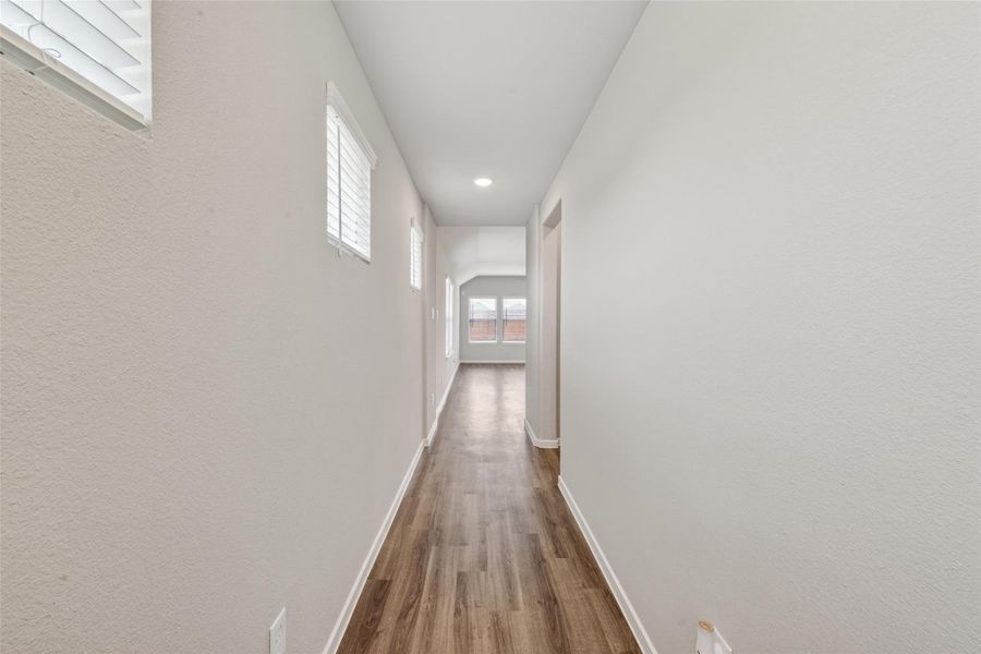 Spacious, unfurnished interior of a new home in Sunterra, Katy (Image 32).