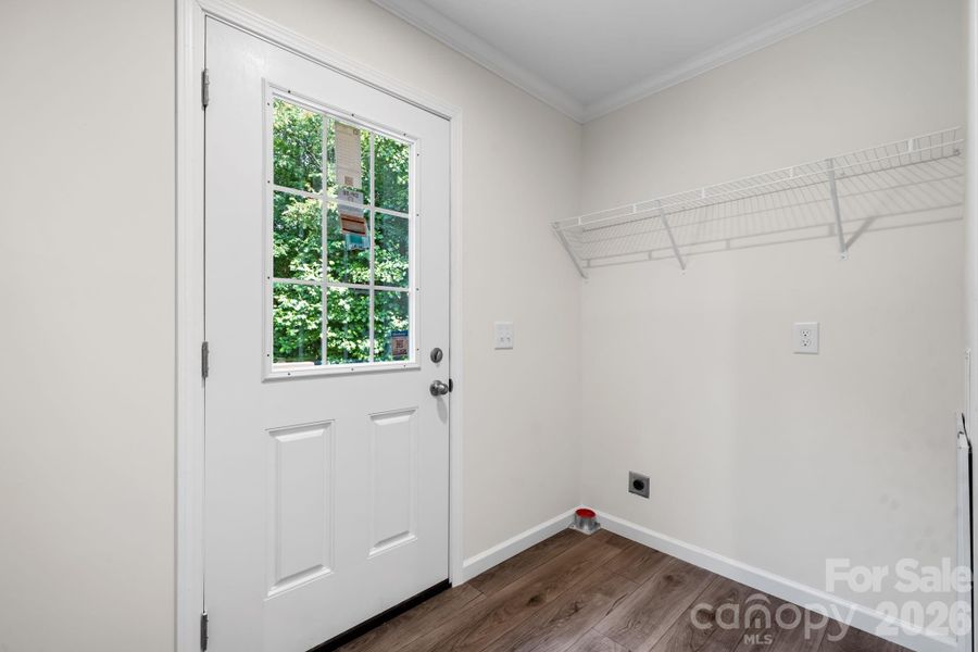 Door to back deck in laundry room.