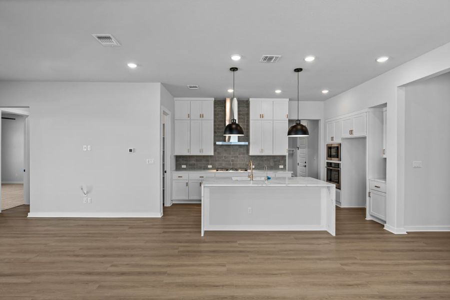 Furnished interior view inside a new home in Arbor Collection at Lariat, Liberty Hill (Image 13). Furnished interior view inside a new home in Arbor Collection at Lariat, Liberty Hill (Image 13).