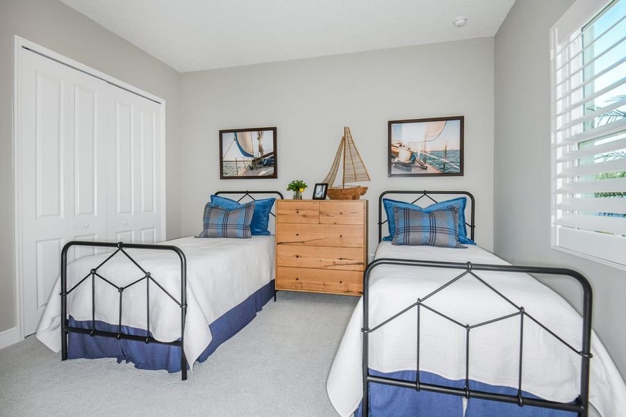 Furnished interior view inside a new home in Grand Park, Sarasota (Image 18).