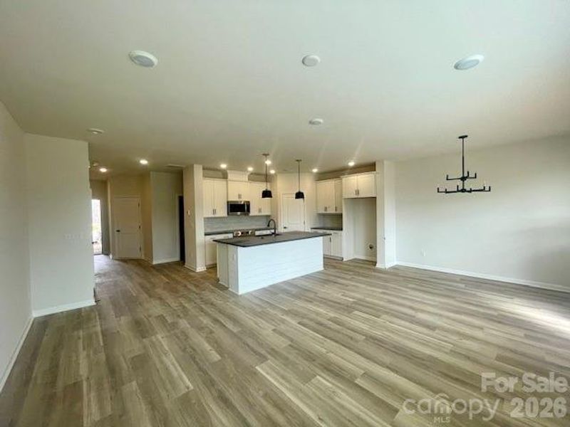 Actual home professional photos due 3/15- 42" cabinets with soft close doors & drawers, tiles backsplash, oversized island with shiplap accent. Nero honed granite countertops, Frigidaire appliances, cooking exhausted vented to the outside. Large pantry with sold shelving.