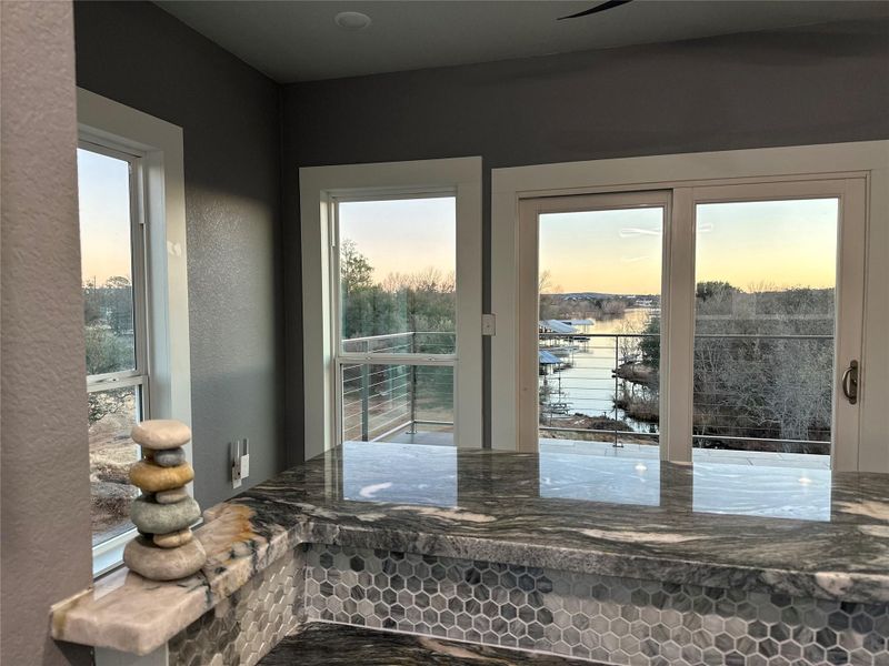 Large upper deck off game room , all with panoramic lake views Large upper deck off game room , all with panoramic lake views