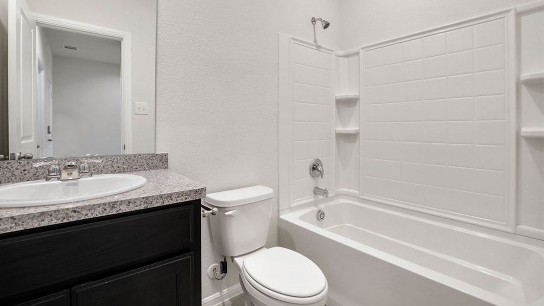 Representative furnished interior of a home built from the Ozark by D.R. Horton in Saratoga, Granbury (Image 10).