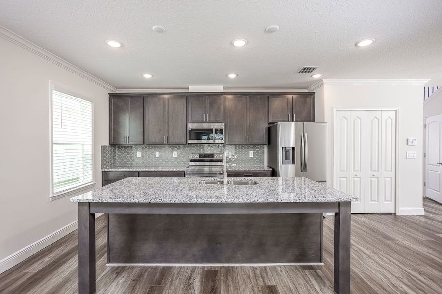 Representative furnished interior of a home built from the Carrington by Maronda Homes in Malabar Springs, Palm Bay (Image 6).