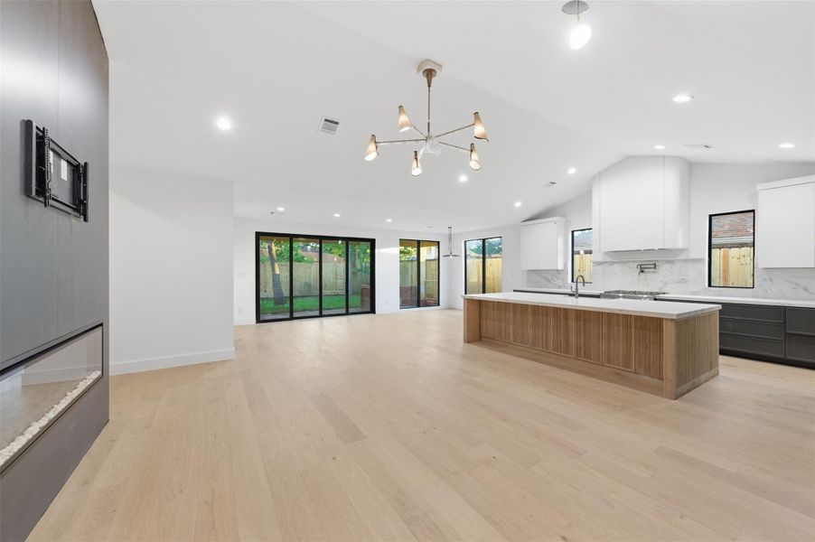 Filled with natural light and designer finishes, this stunning open living space was thoughtfully designed for modern lifestyles.