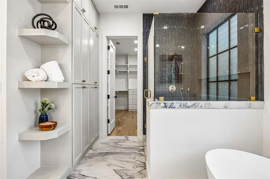 This home has so much built in storage, including the primary bathroom This home has so much built in storage, including the primary bathroom