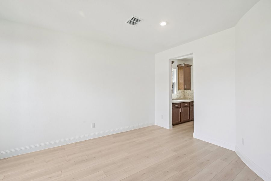 Spacious, unfurnished interior of a new home in The Ranch at Uptown Celina, Celina (Image 32).