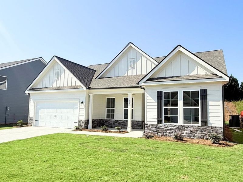 Front exterior of a new home in Sutton’s Landing, Statham, GA, highlighting curb appeal (Image 19).
