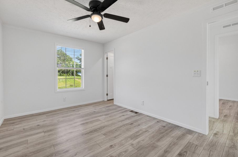 Spacious, unfurnished interior of a new home in , Cross (Image 33).