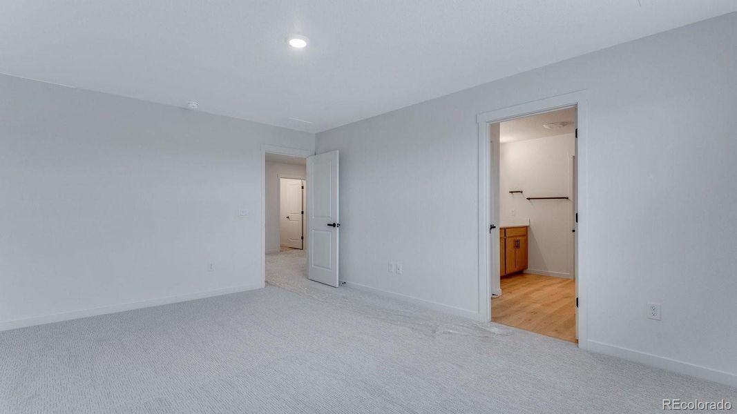 Spacious, unfurnished interior of a new home in Trails at Crowfoot, Parker (Image 32).