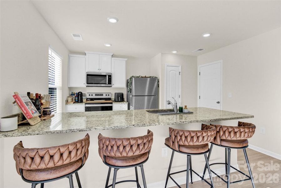Furnished interior view inside a new home in , Charlotte (Image 4).