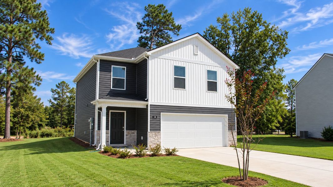 Front exterior of a new home in Evergreen Landing, Rossville, GA, highlighting curb appeal (Image 20). Front exterior of a new home in Evergreen Landing, Rossville, GA, highlighting curb appeal (Image 20).