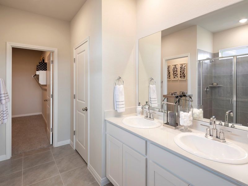 Enjoy the spa-like luxury of the primary bathroom.