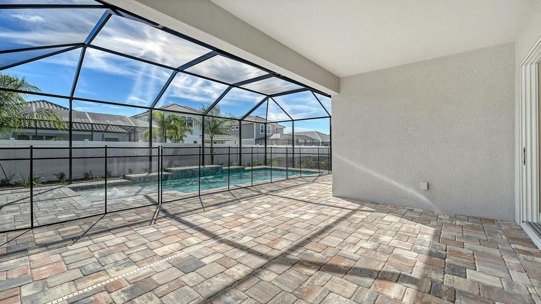 Exterior details and patio area of a home in Windward Real Estate and Homes for Sale in Sarasota, FL - Neal Communities, Lakewood Ranch (Image 24).
