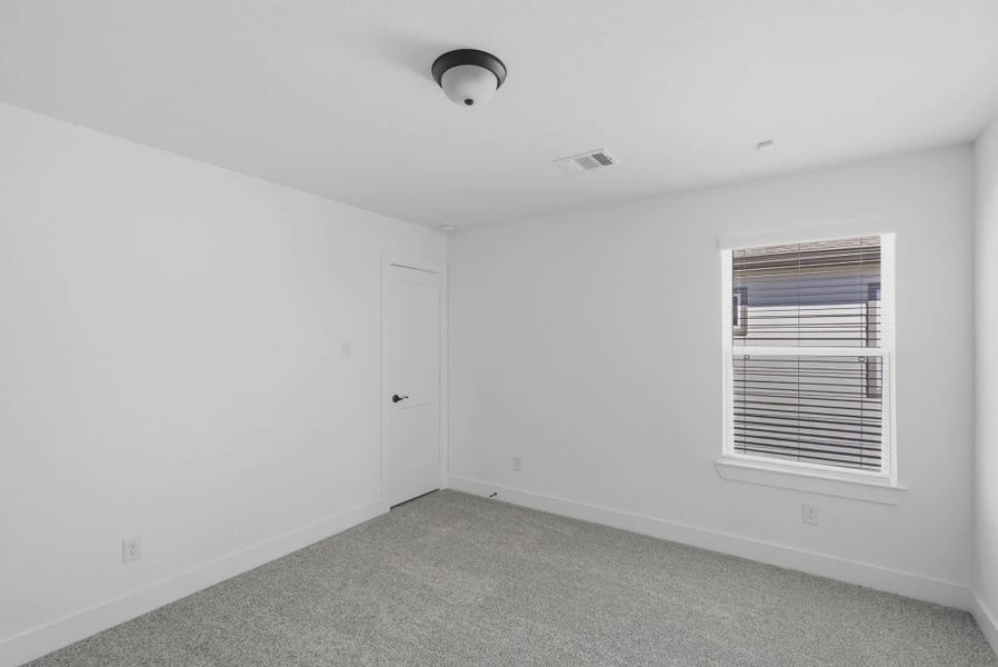 Representative unfurnished interior of a home built from the Emma by Chesmar Homes in Bridgeland, Elgin (Image 24).