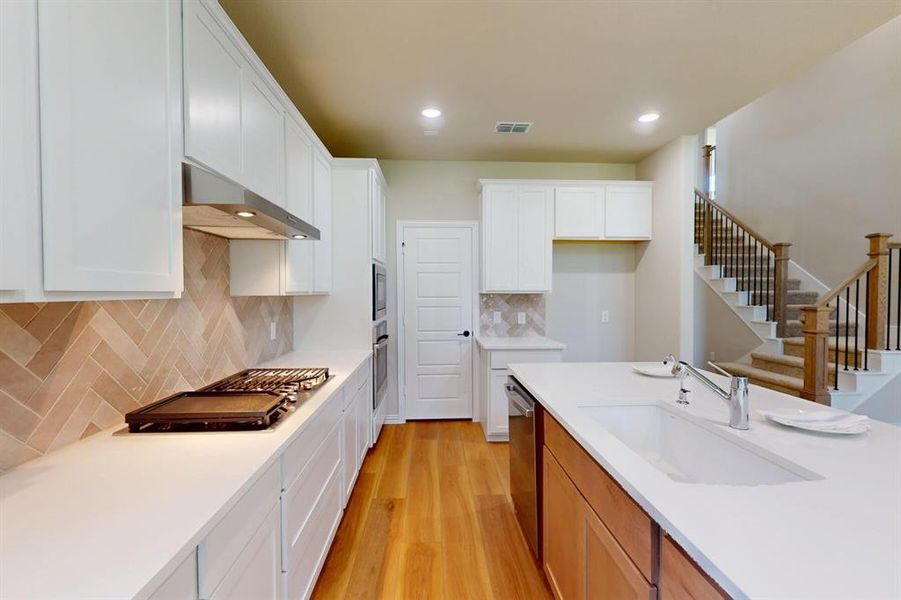 Furnished interior view inside a new home in Vintage Village, Argyle (Image 8).
