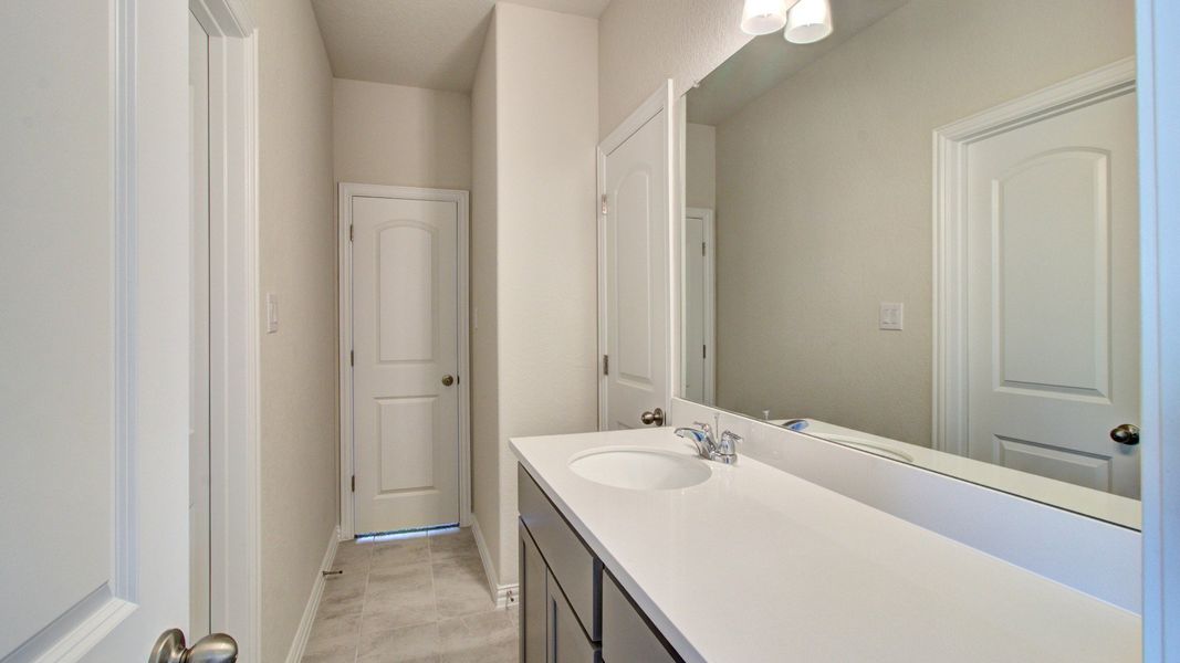 Furnished interior view inside a new home in The Crossvine, Schertz (Image 25).