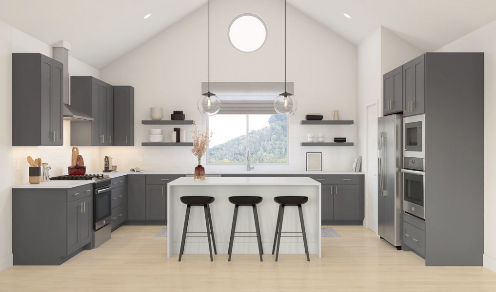 Kitchen with spacious island and stainless appliances