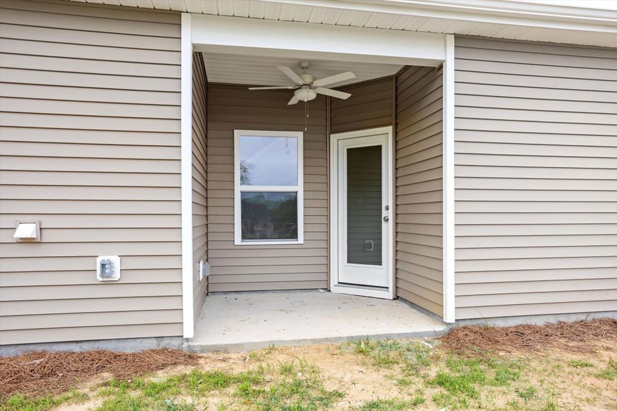 Exterior details and patio area of a home in Cambridge Reserve, Angier (Image 3).