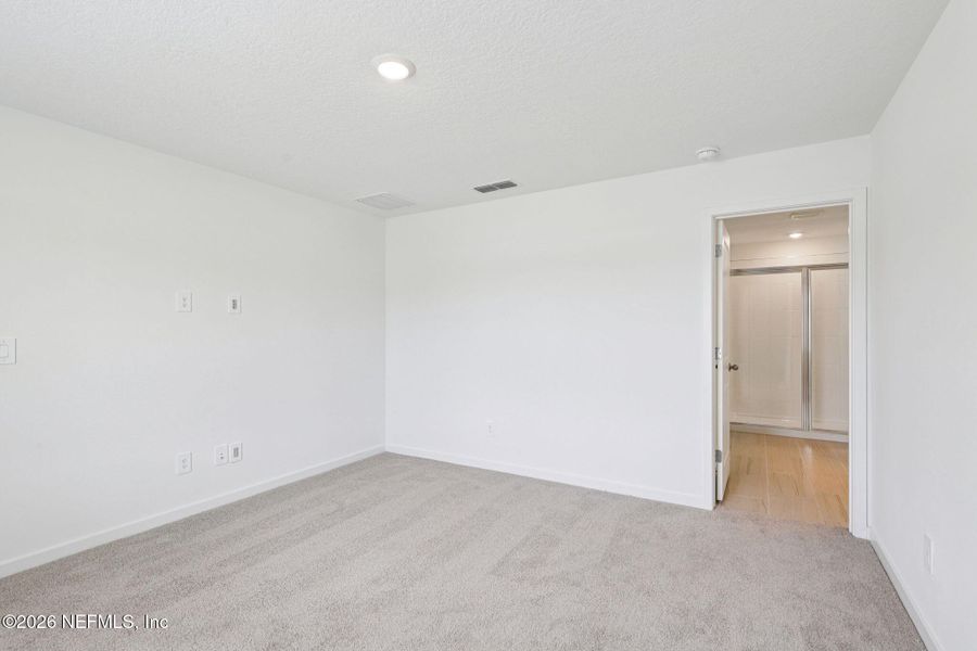 Spacious, unfurnished interior of a new home in Colbert Landings, Palm Coast (Image 21).