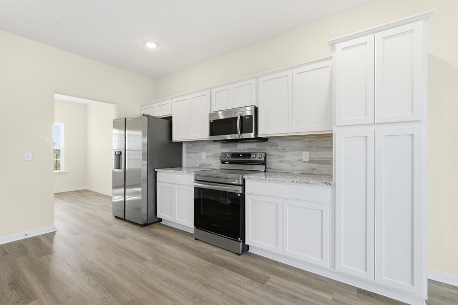 Representative furnished interior of a home built from the The Catherine by RTS Homes in Tibet Road at Sassafras, Allenhurst (Image 9).