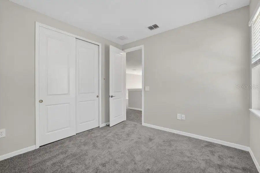 Spacious, unfurnished interior of a new home in Firethorn, Parrish (Image 29).