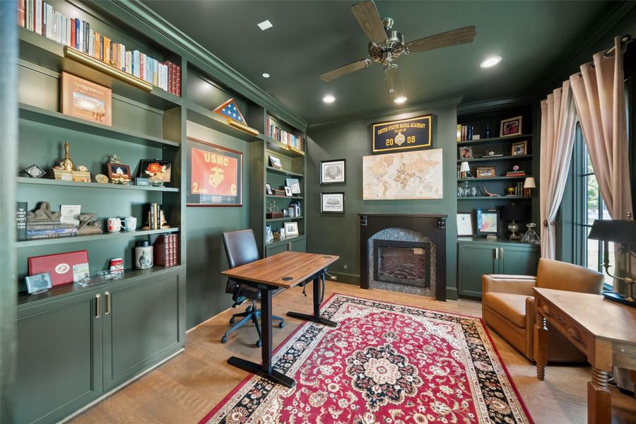 Color drenched and richly toned, this downstairs office offers a dark, moody aesthetic that creates a sophisticated and focused workspace, perfect for working from home or a quiet retreat.