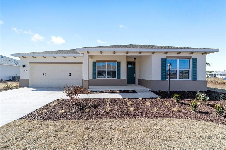 Front exterior of a new home in , Ocala, FL, highlighting curb appeal (Image 20).