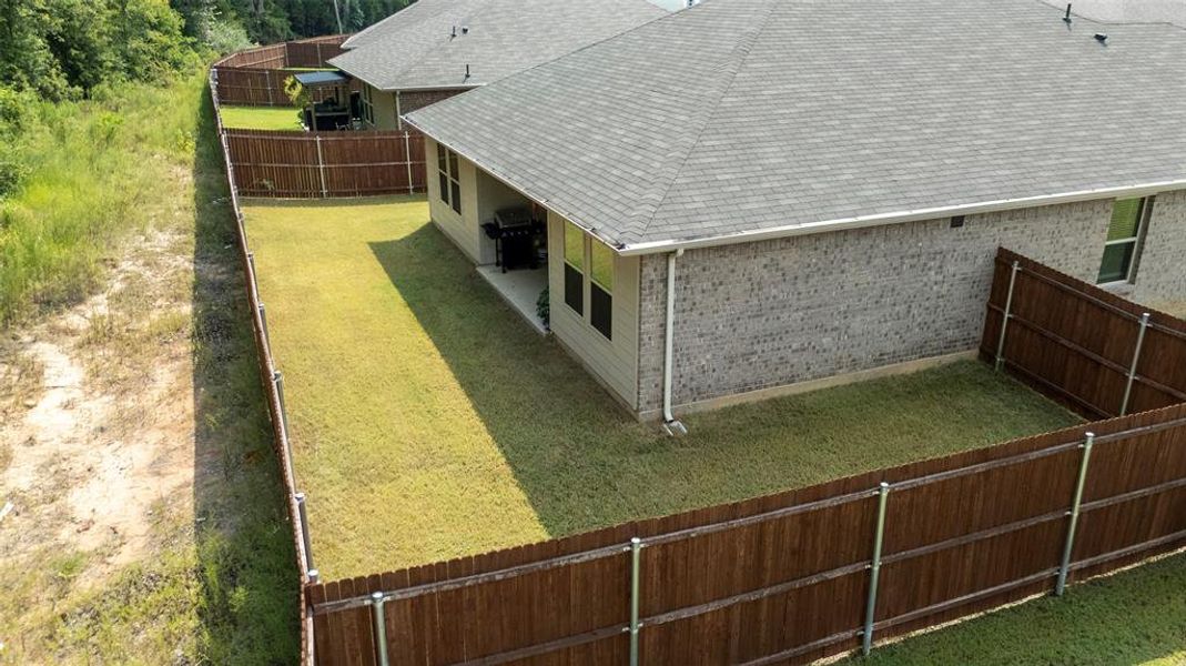 Front exterior of a new home in , Chandler, TX, highlighting curb appeal (Image 23). Front exterior of a new home in , Chandler, TX, highlighting curb appeal (Image 23).