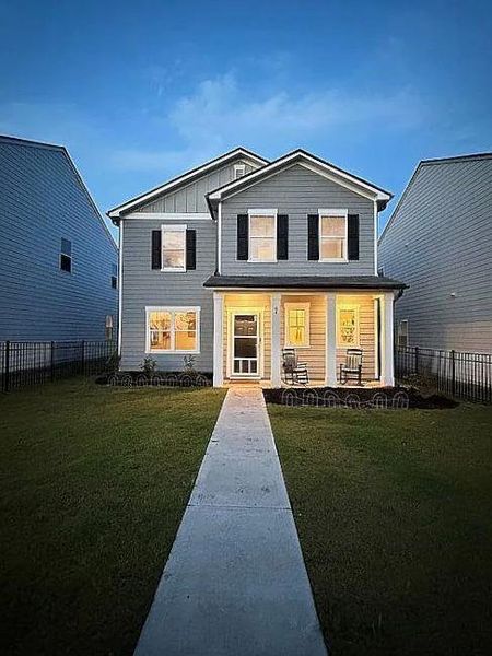 Front exterior of a new home in Casteel, Bethlehem, GA, highlighting curb appeal (Image 1). Front exterior of a new home in Casteel, Bethlehem, GA, highlighting curb appeal (Image 1).