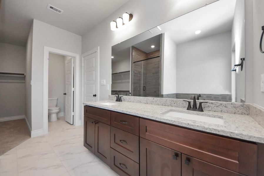 Furnished interior view inside a new home in Hill & Dale Ranch, Splendora (Image 12).