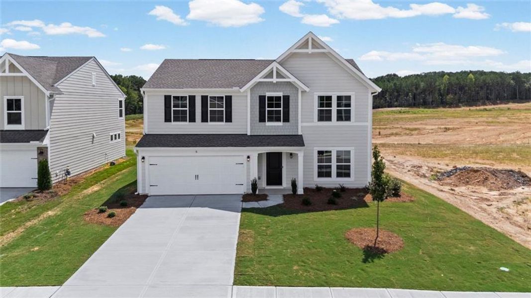 Front exterior of a new home in Three Rivers, Rome, GA, highlighting curb appeal (Image 19). Front exterior of a new home in Three Rivers, Rome, GA, highlighting curb appeal (Image 19).