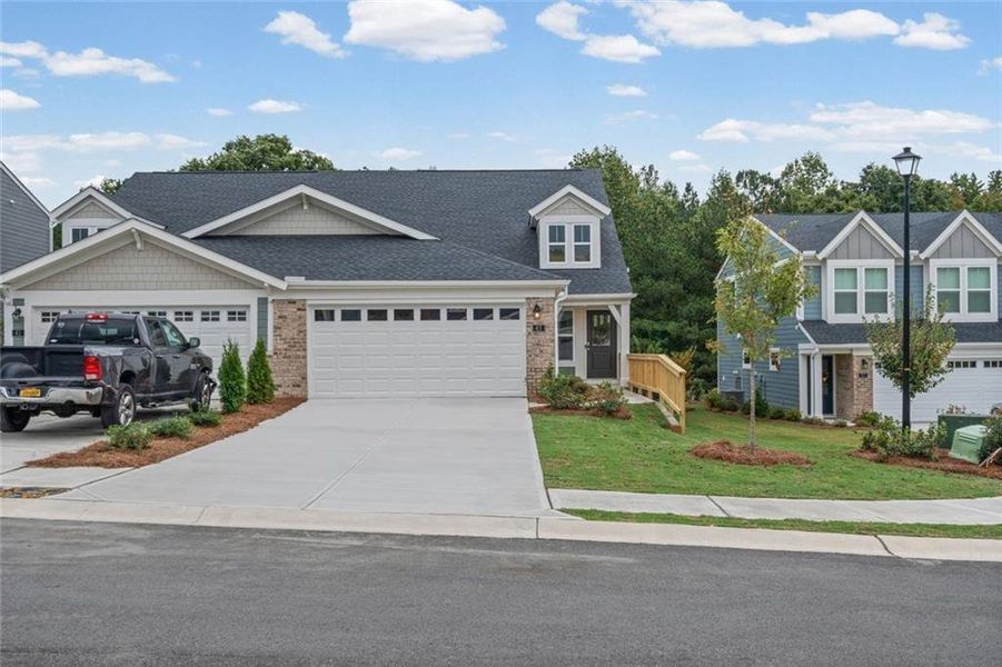 Front exterior of a new home in Villas at Gold Creek, Dawsonville, GA, highlighting curb appeal (Image 20).