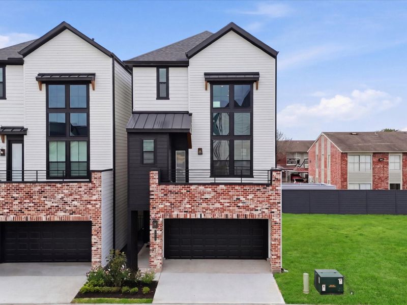 Front exterior of a new home in Uptown District, Houston, TX, highlighting curb appeal (Image 1). Front exterior of a new home in Uptown District, Houston, TX, highlighting curb appeal (Image 1).