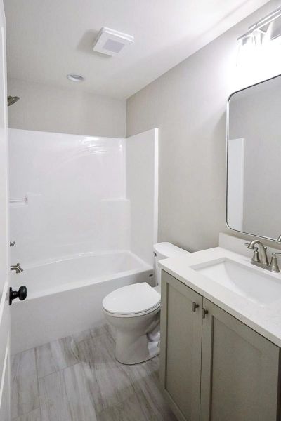 Furnished interior view inside a new home in Baker Road, Birchwood (Image 37).