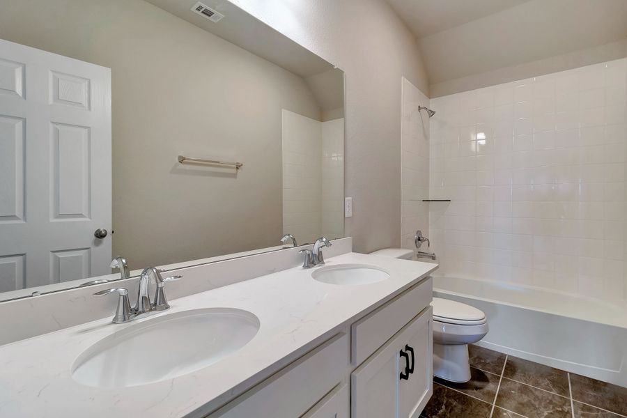 Secondary bath. Note: Sample product photo - actual exterior and interior selections may vary by homesite