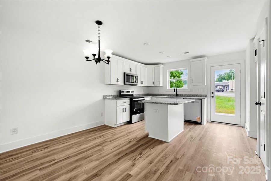 Furnished interior view inside a new home in , Albemarle (Image 4).