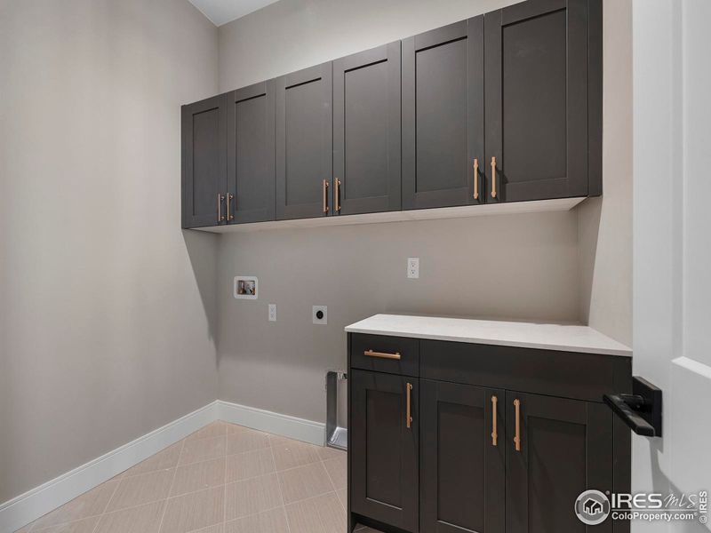 Laundry room is conveniently located off of the mudroom