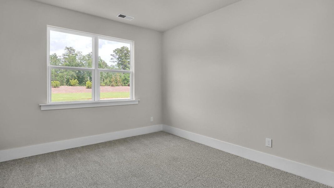 Spacious, unfurnished interior of a new home in Indigo Preserve, Leland (Image 22).